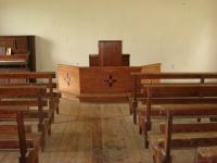 A view down the aisle from the back of the church.