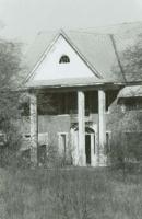 A closeup of the front of the Huie House.