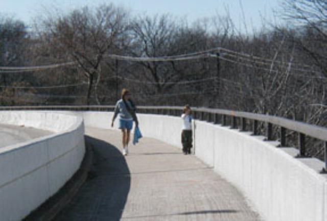 Nice pedestrian walkway along the street bridge.