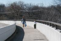 Nice pedestrian walkway along the street bridge.